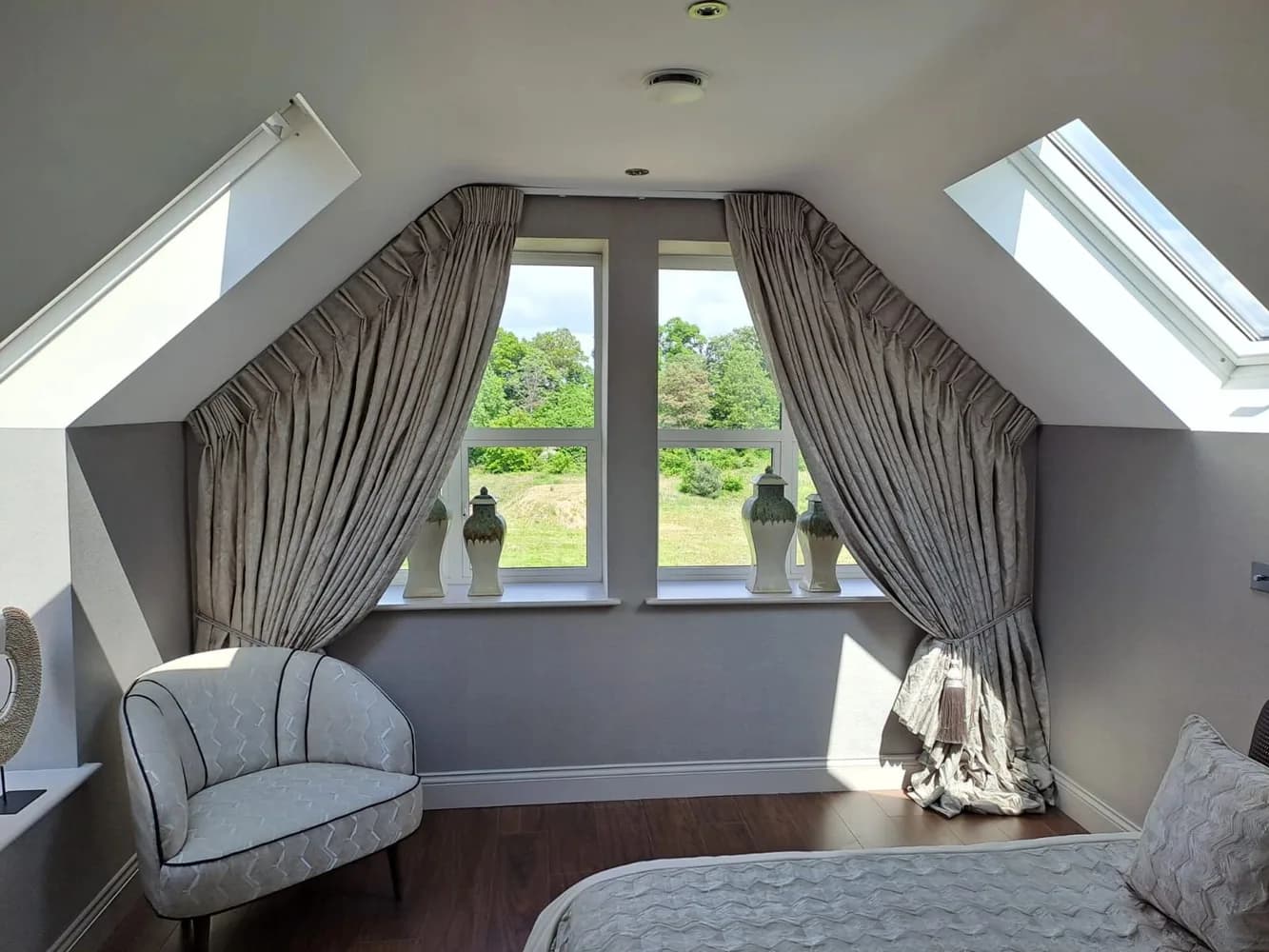 Show House Bespoke Twin pleated curtains fitted into Apex area.