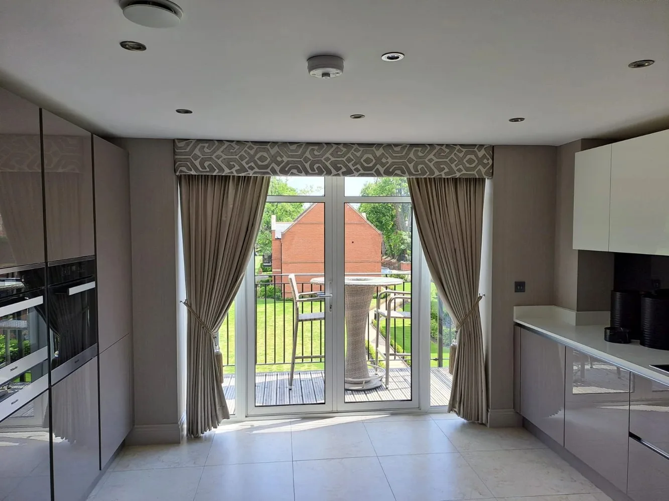 Kitchen tie back curtains onto balcony
