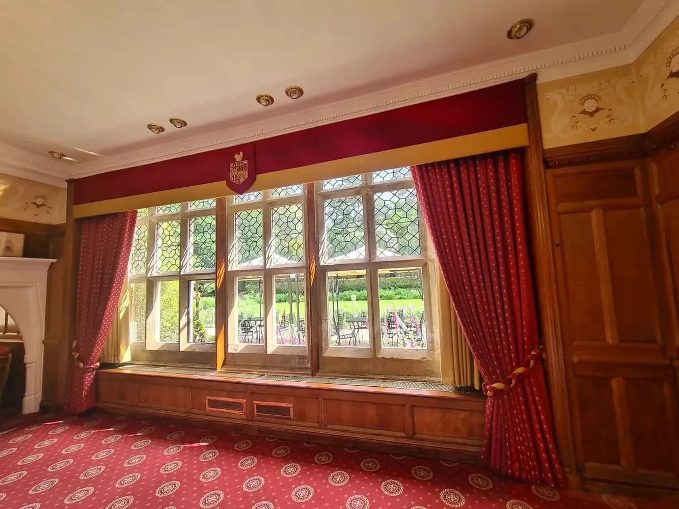 Hotel - Curtains with Tie back and including Bespoke Crest in the centre of Pelmet.