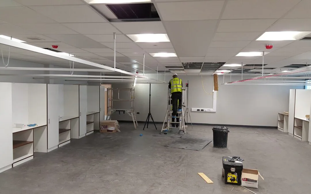 Installation of curtain track systems for beauty school