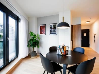 Full-height curtains installed in a contemporary room