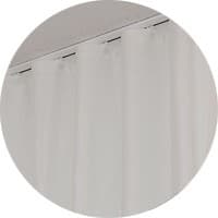 White wave curtains beneath a recessed track